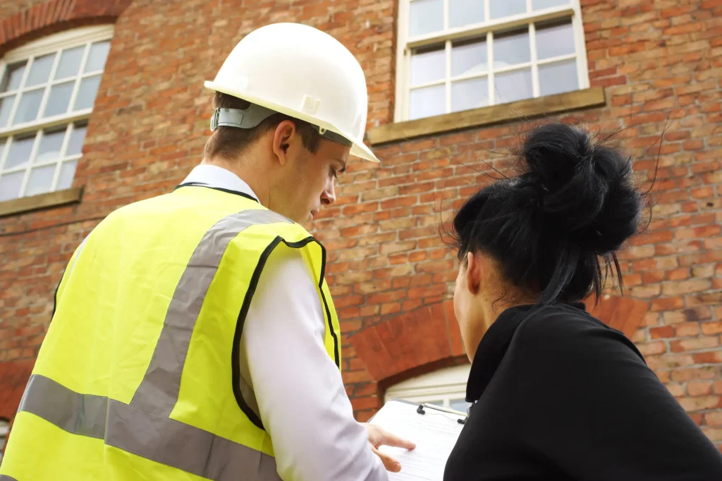 energysmith home performance professional shows woman results of a home energy audit